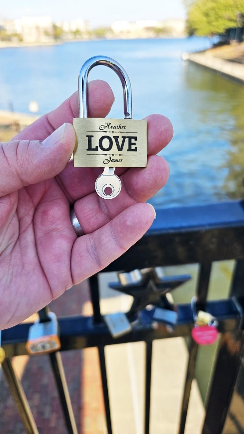 james about to attach love lock to bridge