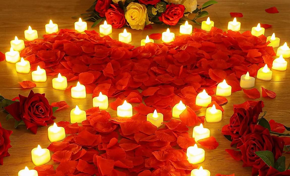 heart shaped candles and rose petals make a beautiful romantic display