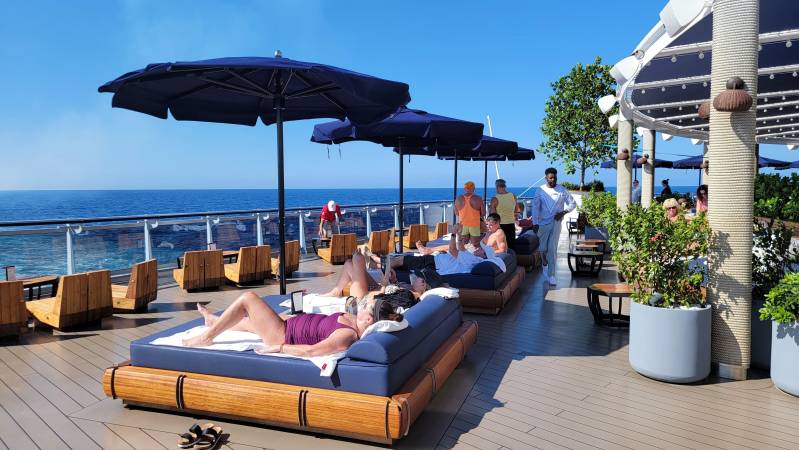 virgin voyages sun chairs relaxing
